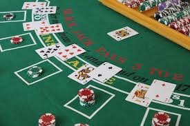 Close-up view of roulette table layout with betting zones and chip denominations